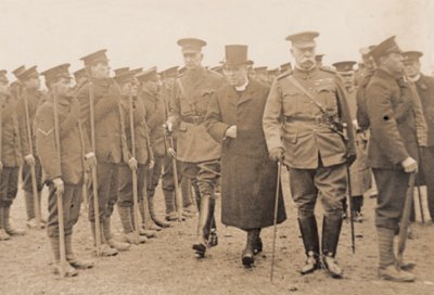 Lord Grenfell, The Archbishop of Canterbury and Lieutenant Colonel Kindersley-Porcher inspect the Battalion Denham Golf Course.