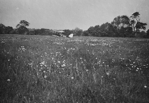 de Haviland Gipsy Moth G-ABAG on the grass at Hawksridge, Denham, on one of the early test flights by Myles Bickerton into the new airfield in 1934.