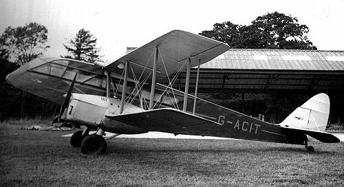 De Havilland dH84 Dragon G-ACIT of the Airways Aero Associations Ltd seen here in front of hangar J in 1948 before the back wall had been built.