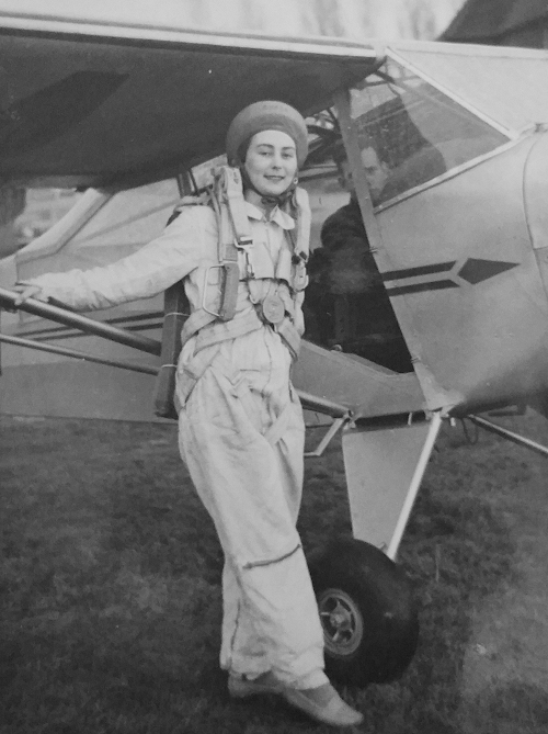 Britain's first female parachutist, Phyllis 'Phyl' Weir seen at Denham in 1950 with one of the flying club's Auster aircraft, ready for another jump.