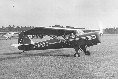 One of the people behind the BBC's presence was test pilot Ranald Porteous, seen here taxying out in Auster J5R Alpine G-ANXC on the day.