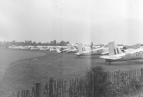 The RAF also flew into Denham for the BBC, three Hunting Percival Piston Provosts of the London University Air Squadron lined up here with aircraft from the home based flying clubs.
