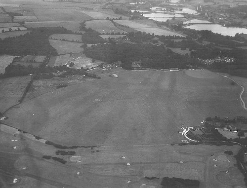 The aircraft based on the north side of the aerodrome benefited from a new fuel installation next to the hangars. Note the flying club is still in its hut on the south side and the extended flying area made possible by the purchase of part of Abrahams field is visible in this image taken in 1960.
