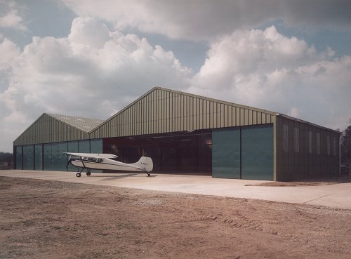 The brand new Hangar E with Cessna 170 G-ABLE, a long time 1960s Denham resident parked on the apron.