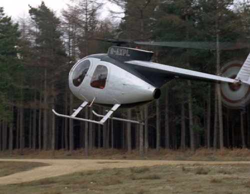 Repainted into this black and silver scheme for the 4th Viscount Cowdray, G-AXPL is seen here in episode 11 of The Persuaders.
