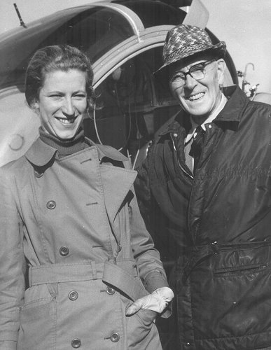 Gay Absalom with aerodrome founder Myles Bickerton in front of one of Air Gregory's Hughes 300 helicopters at Denham in 1974.