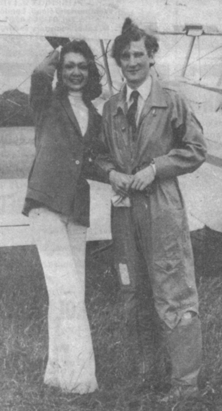 Hawaiian model Dayang with Tiger Club pilot John Wilkinson, being shown around the Stampe SV.4b at the Tiger Club show at Denham on 1 August.