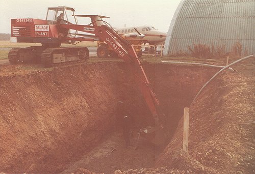 A 12,000 gallon underground tank required considerable excavation, the bottom of which was then lined with concrete.