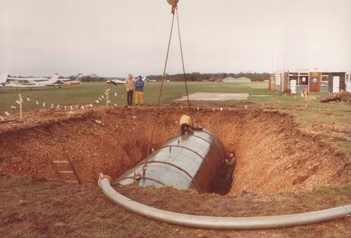 The scale of the tank is amply illustrated by the size of the people working on it. Ian Paul, himself a gas and oil pipeline engineer, can be seen on the left of the excavation.