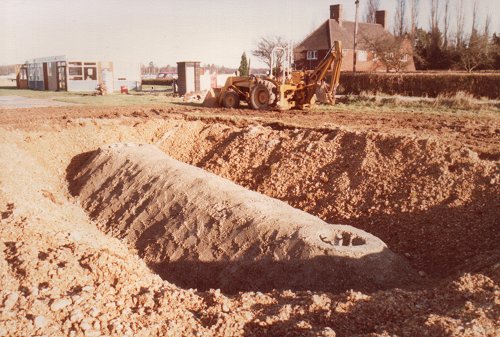 Tank 7 now encased in its concrete shell and ready to be covered. The aerodrome's own Massey Ferguson tractor, Nellie, was useful in recovering the site.