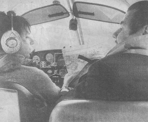 Regular Denham pilot Owen Cubbit, left, and Paddy Hember, photographer for the Bucks Free Press, seen in the cockpit of their Cherokee en route to Jersey.