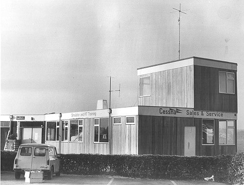 The completed radio room on the roof of the south side office building. Note the original signs left by the recently departed Denham School of Flying Training.