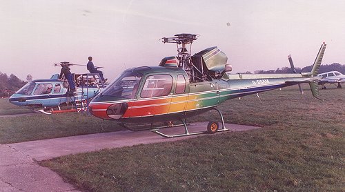 Two Aerospatiale AS.350B Squirrels outside Hangar J being worked on by European Helicopters.