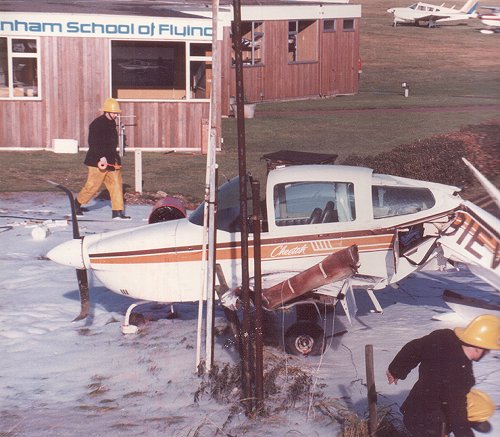 Although this Cheetah struck the flying school building before coming to rest on the south side, no one was hurt.