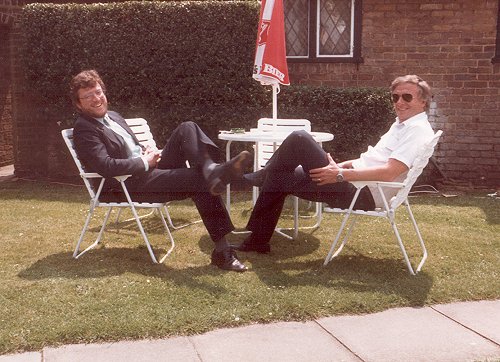 One of the directors of Hana Aviation, Steve Read, with a customer outside Biggles restaurant.