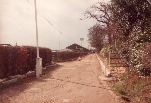 Looking west along Hangar Road from the Tilehouse Lane end with the new kerbs being put in place.
