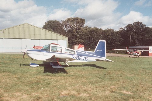 This Grumman AA-5B Tiger was crushed when another aircaft turned over on top of it during the storm of October 1987.