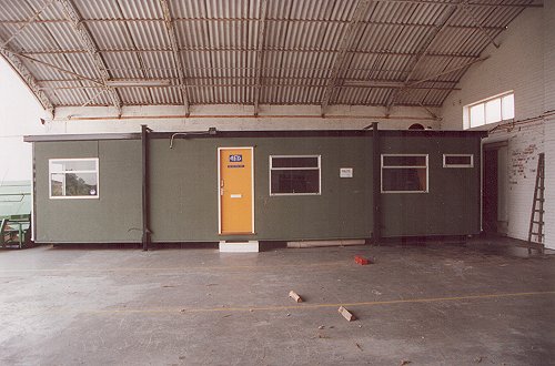 A temporary office building was placed in the blister hangar for the Denham Cessna Flight Centre.