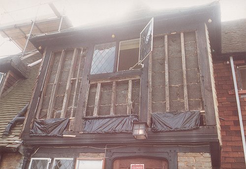 The front wall of Biggles' was stripped .