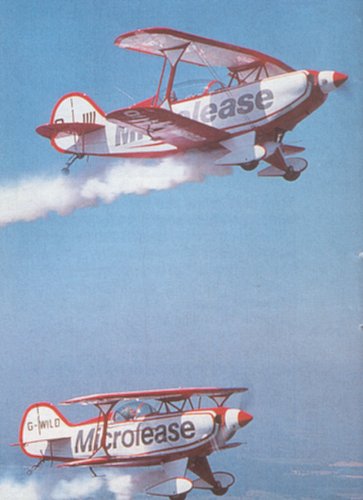 The single seat Pitts S.1S was joined by the more powerful two seat Pitts S.2B in 1990, both in the colours of IT management company Microlease.
